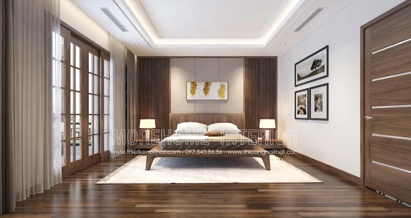 Mẫu giường ngủ gỗ óc chó với phần chân thiết kế cách điệu mang đến cho không gian phòng ngủ thêm phần rộng thoáng, sang trọng